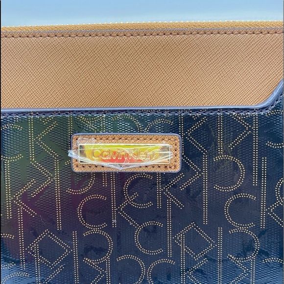 Calvin Klein Monogram Wristlet - Picture 3 of 8